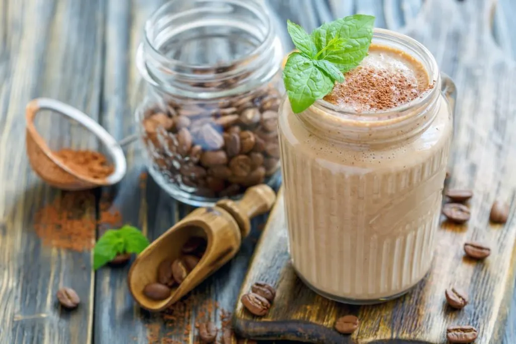Coffee smoothie with banana in a glass jar