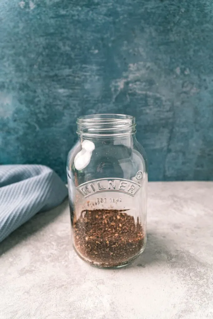 add coarse ground coffee to mason jar